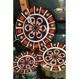 THREE ROYAL CROWN DERBY IMARI PLATES, '1128' pattern, diameters 27cm, 22cm and 16cm (seconds) (3)