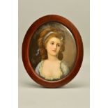 A 19TH CENTURY OVAL PORCELAIN PLAQUE, possibly KPM, painted with a portrait of a late 18th Century
