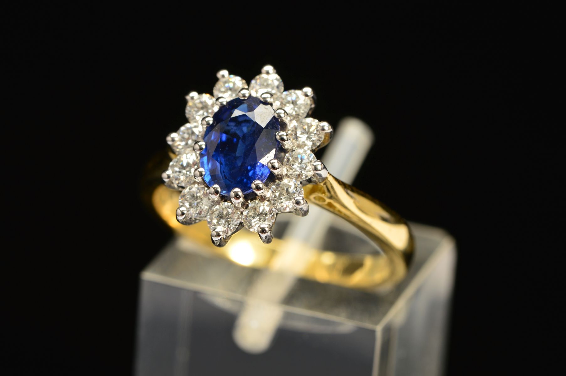 A MODERN 18CT GOLD SAPPHIRE AND DIAMOND OVAL CLUSTER RING, oval blue sapphire measuring - Image 3 of 5