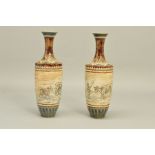 A PAIR OF DOULTON LAMBETH STONEWARE HANNAH BARLOW BALUSTER VASES, the central band incised with a