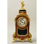 AN EARLY 20TH CENTURY FRENCH BOULLE MARQUETRY EBONISED AND ORMOLU MANTEL CLOCK, the finial with