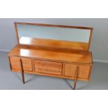 A WRIGHTONS 1960’S TEAK DRESSING TABLE, with a rectangular mirror above two long drawers flanked