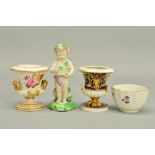 A LATE 18TH CENTURY DERBY PORCELAIN FIGURE OF SPRING, in the form of a putto wearing garlands of