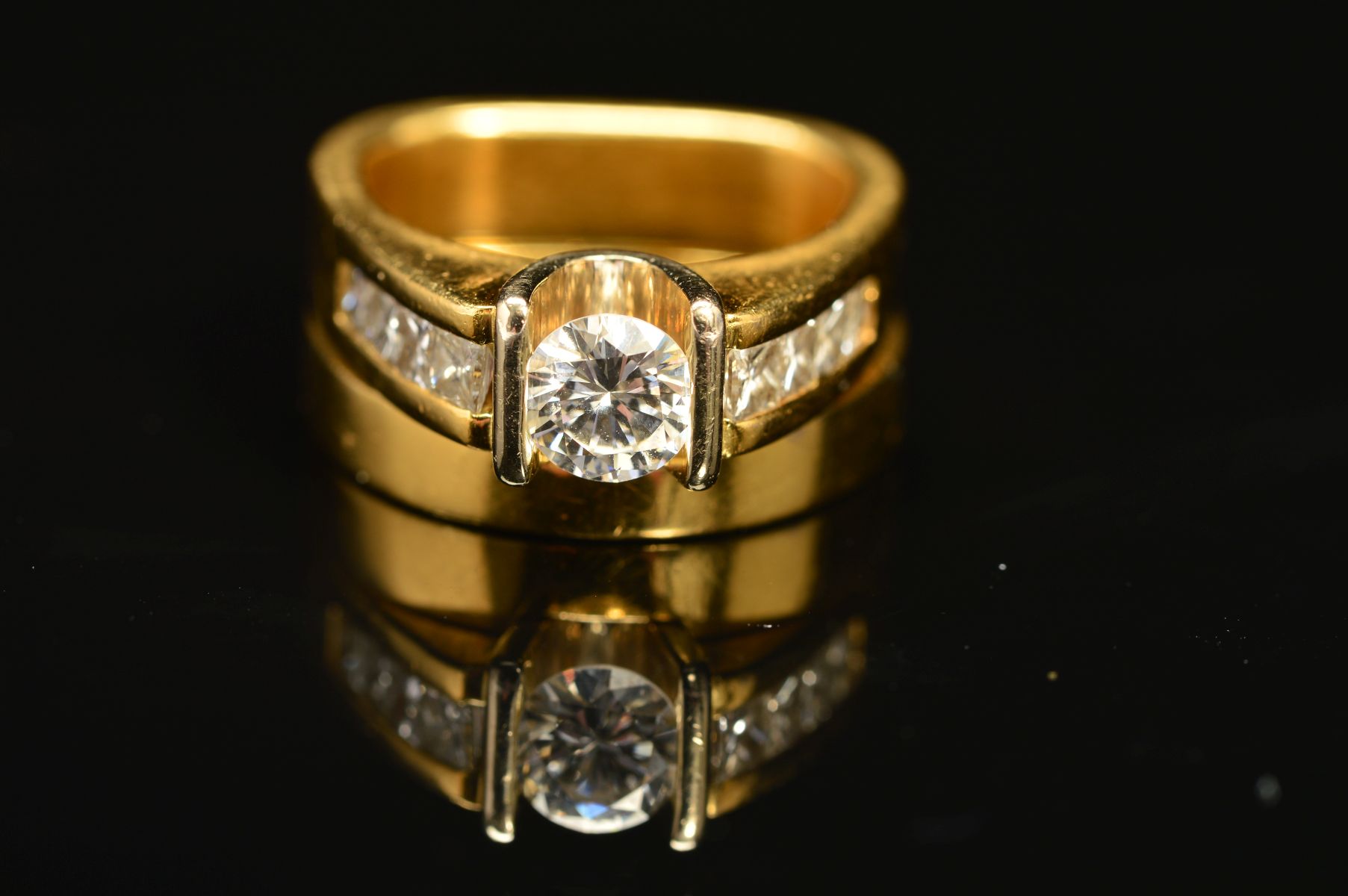 TWO RINGS, the first an abstract design diamond ring, centring on a principle modern round brilliant - Image 2 of 5