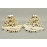 A PAIR OF 18TH CENTURY VIENNA PORCELAIN TABLE CENTREPIECES, of Rococo form, with a wavy rimmed