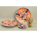 A PAIR OF LATE 19TH CENTURY JAPANESE IMARI PORCELAIN CHARGERS, wavy rims, decorated with flowers,