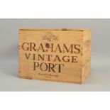 A CASE OF TWELVE BOTTLES OF GRAHAM'S VINTAGE PORT, 1977, a classic vintage, the case has been