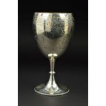 A VICTORIAN SILVER TROPHY CUP, foliate engraved decoration with beaded knop to pedestal and beaded
