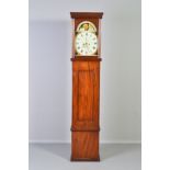 AN EARLY 19TH CENTURY WALNUT LONGCASE CLOCK, the plain hood with moulded cornice and columns, arched