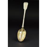 A GEORGE IV SILVER FIDDLE AND THREAD PATTERN GRAVY STRAINING SPOON, engraved crest, the bowl with