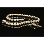 A LATE 20TH CENTURY 18CT WHITE GOLD DIAMOND LINE BRACELET, estimated total diamond weight 2.28ct,