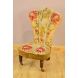 A MID VICTORIAN NURSING CHAIR WITH ORIGINAL BERLIN WOOLWORK AND VELVET UPHOLSTERY, the wavy back