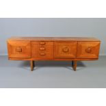 A STONEHILL TEAK SIDEBOARD, the door fronts with a geometric pattern and central shaped handle,