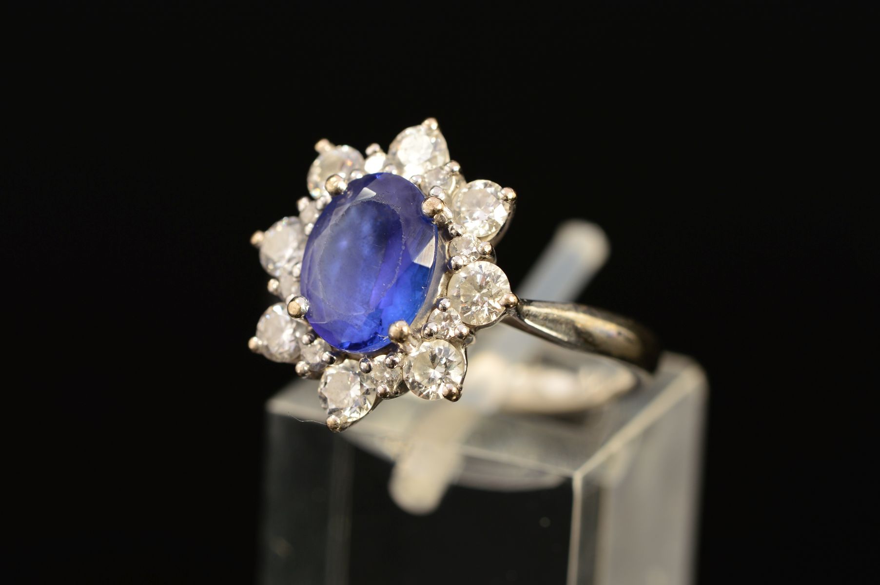 A MODERN 18CT WHITE GOLD TANZANITE AND DIAMOND OVAL CLUSTER RING, oval mixed cut tanzanite measuring - Image 3 of 5
