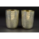 A PAIR OF VICTORIAN SILVER CYLINDRICAL BEAKERS, gilt interiors, engraved bands to the rims with