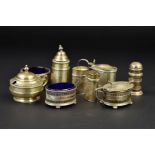 THREE SETS OF SILVER THREE PIECE CRUET SETS, two of oval form and one circular, the circular and