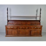 A GEORGE III AND LATER OAK AND MAHOGANY BANDED DRESSER, the open back lacking upper structure,