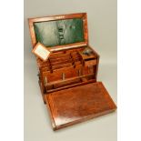 A LATE VICTORIAN OAK STATIONERY BOX, the hinged cover opening to reveal a fitted interior with