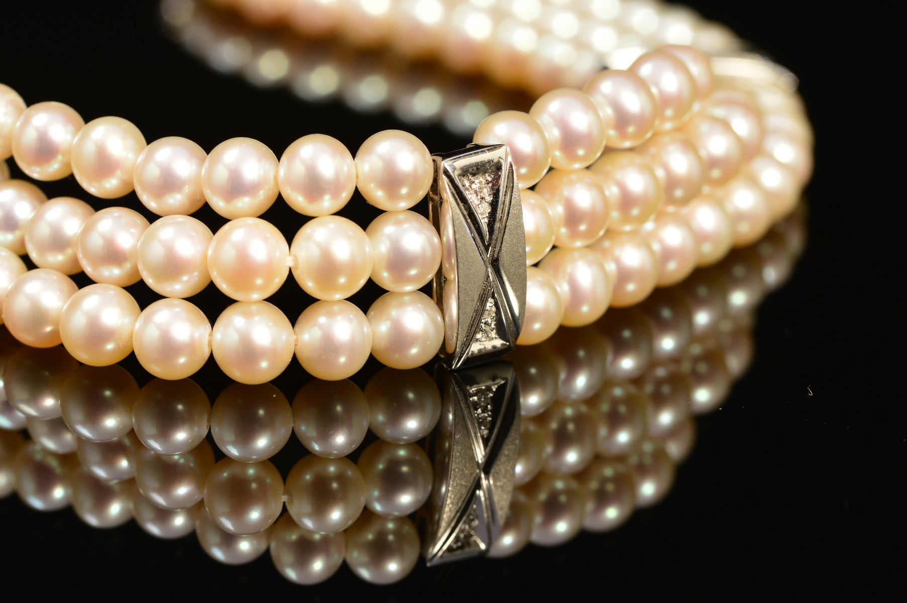 A MODERN 18CT WHITE GOLD, THREE ROW CULTURED PEARL AND DIAMOND BRACELET, each row intersected by a - Image 3 of 3