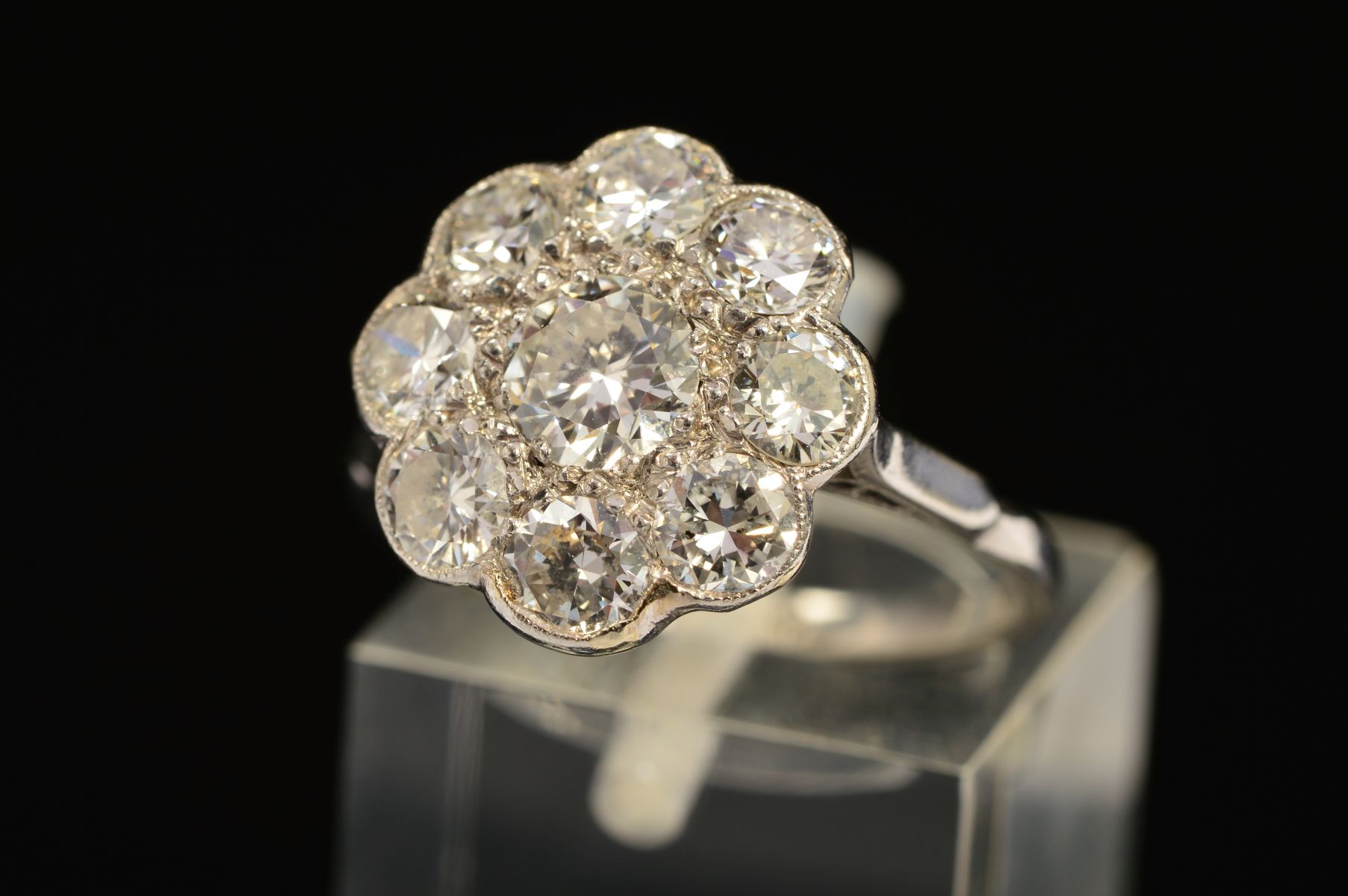 A DIAMOND CLUSTER RING, the central brilliant cut diamond within a surround of eight brilliant cut - Image 3 of 5