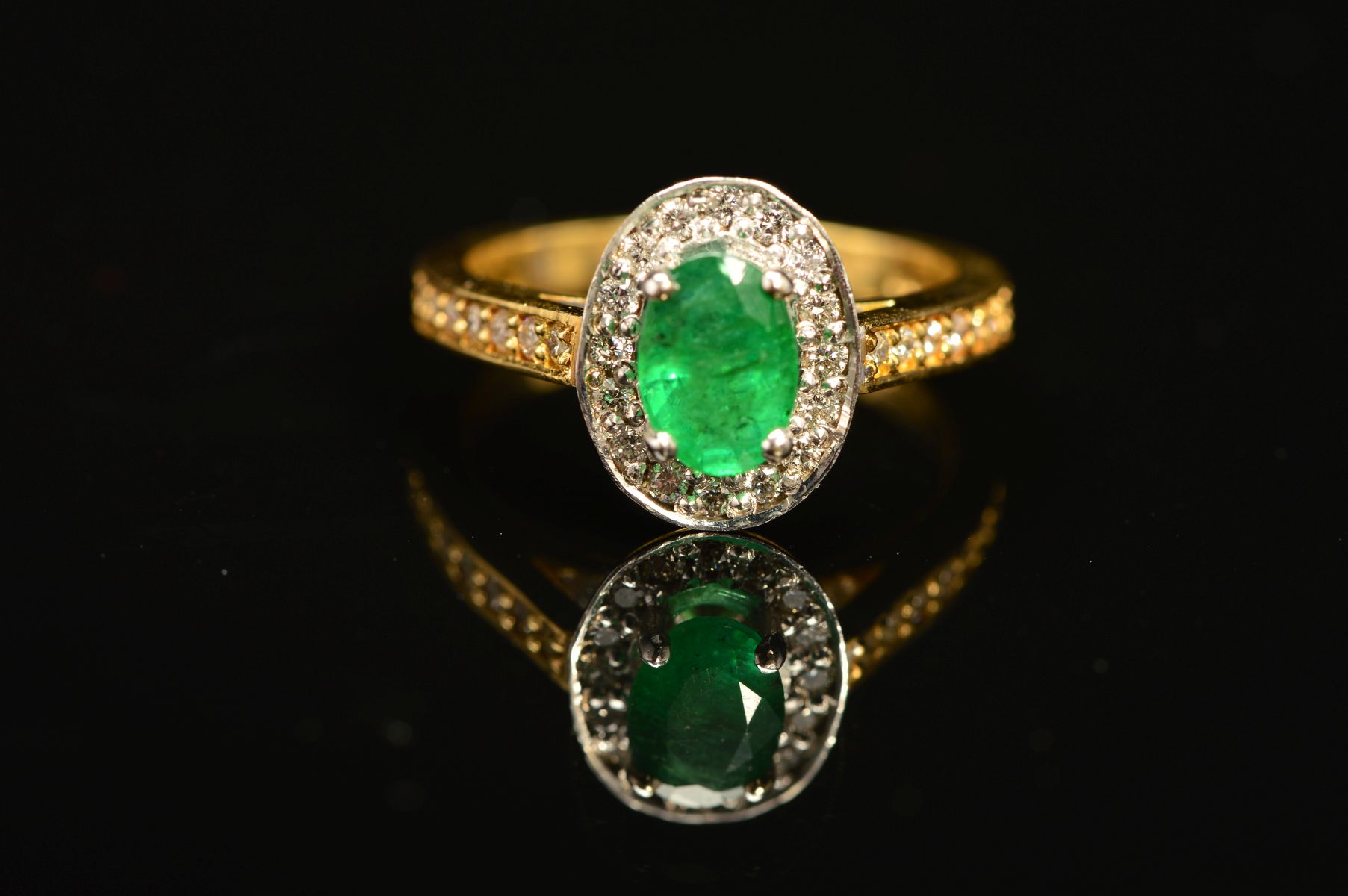 A MODERN 18CT GOLD EMERALD AND DIAMOND HALO CLUSTER STYLE RING, with diamond set shoulders, - Image 2 of 5