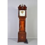 AN EARLY 19TH CENTURY OAK AND MAHOGANY BANDED LONGCASE CLOCK, the broken swan neck pediment with