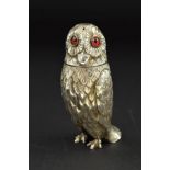 A VICTORIAN SILVER NOVELTY PEPPERETTE, in the form of an Owl, with pull off cover and set with red