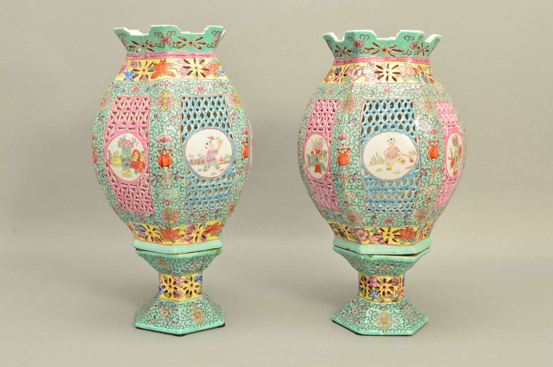 A PAIR OF 20TH CENTURY CHINESE PORCELAIN FAMILLE ROSE TABLE LANTERNS, of hexagonal form, reticulated