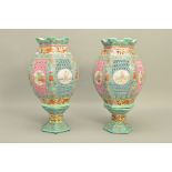 A PAIR OF 20TH CENTURY CHINESE PORCELAIN FAMILLE ROSE TABLE LANTERNS, of hexagonal form, reticulated