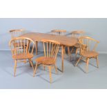 AN ERCOL ELM 1960’S REFECTORY TABLE, on four square tapering beech legs, width 152cm x depth 76.