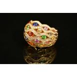 A MODERN 18CT GOLD MULTI GEM AND DIAMOND FANCY BOMBE STYLE DRESS RING, lattice design