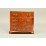 A 20TH CENTURY MINIATURE WALNUT VENEERED BOW FRONT CHEST OF THREE LONG DRAWERS, with gilt metal