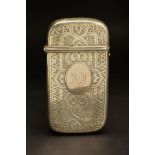 A VICTORIAN SILVER CIGAR CASE, of rounded rectangular form, engraved decoration with raised oval