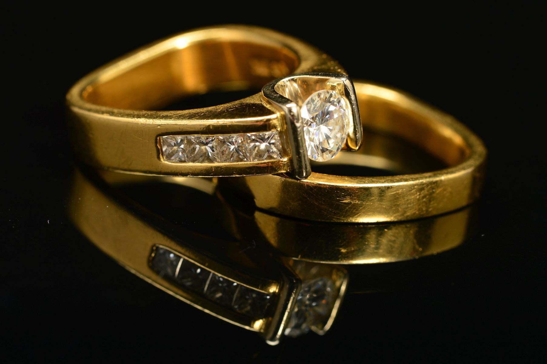 TWO RINGS, the first an abstract design diamond ring, centring on a principle modern round brilliant - Image 3 of 5