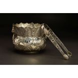 A VICTORIAN SILVER TWIN HANDLED SUGAR BOWL, of oval waisted vase form, embossed decoration of