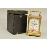 AN EARLY 20TH CENTURY FRENCH BRASS CARRIAGE CLOCK, enamel dial a.f, painted with swags and