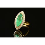 A MODERN 18CT GOLD LARGE EMERALD AND DIAMOND MARQUISE CLUSTER RING, emerald measuring