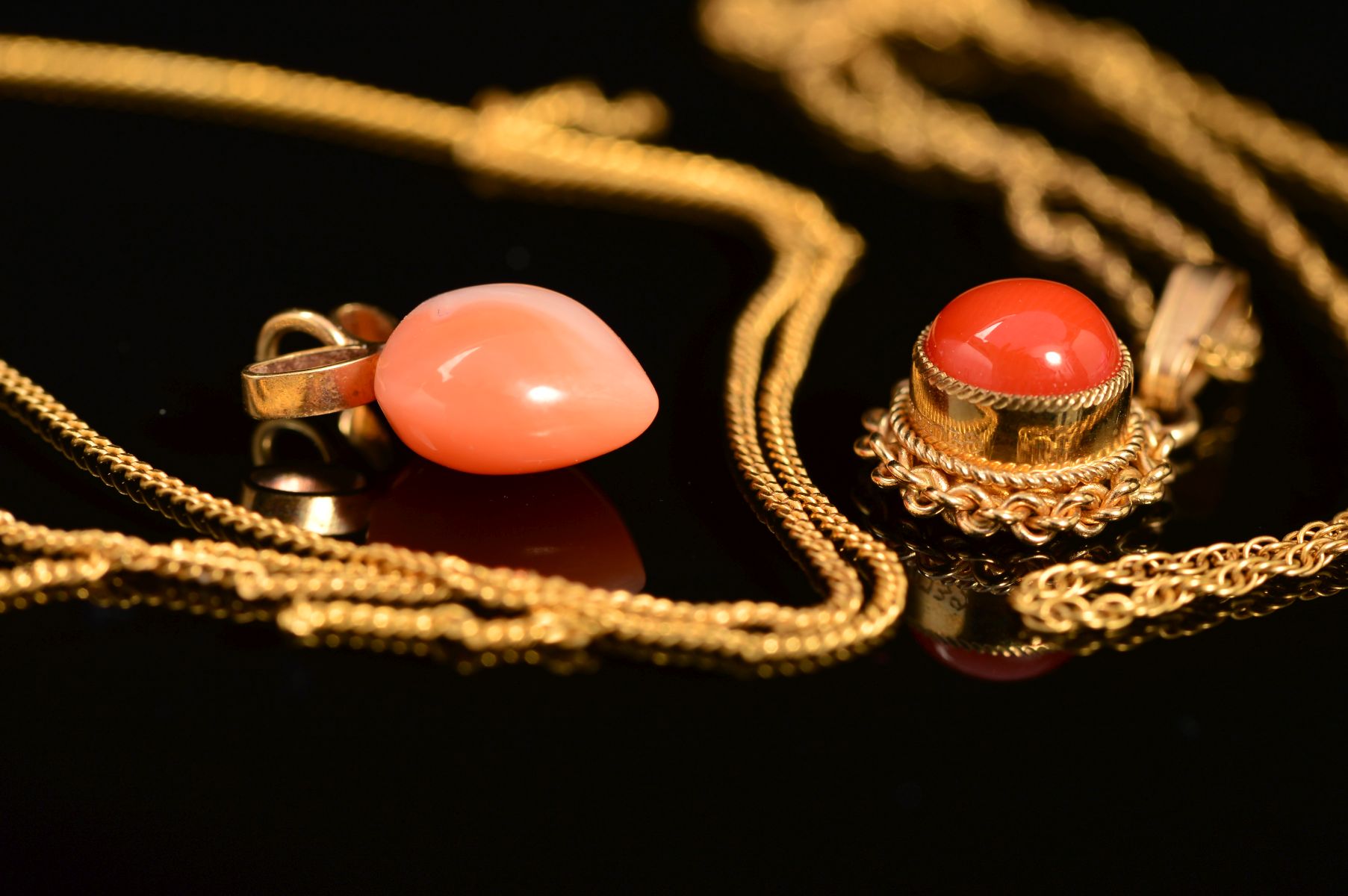 TWO MODERN SMALL CORAL PENDANTS, a heart and a round panel within a twist rope edge border, both - Image 2 of 2