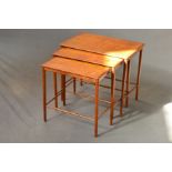 GRETE JALK FOR POUL JEPPESENS MOBELFABRK, DENMARK, a teak nest of three tables on tapered