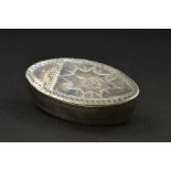 A GEORGE III IRISH SILVER SNUFF BOX, of navette form, bright cut borders to cover and sides, the