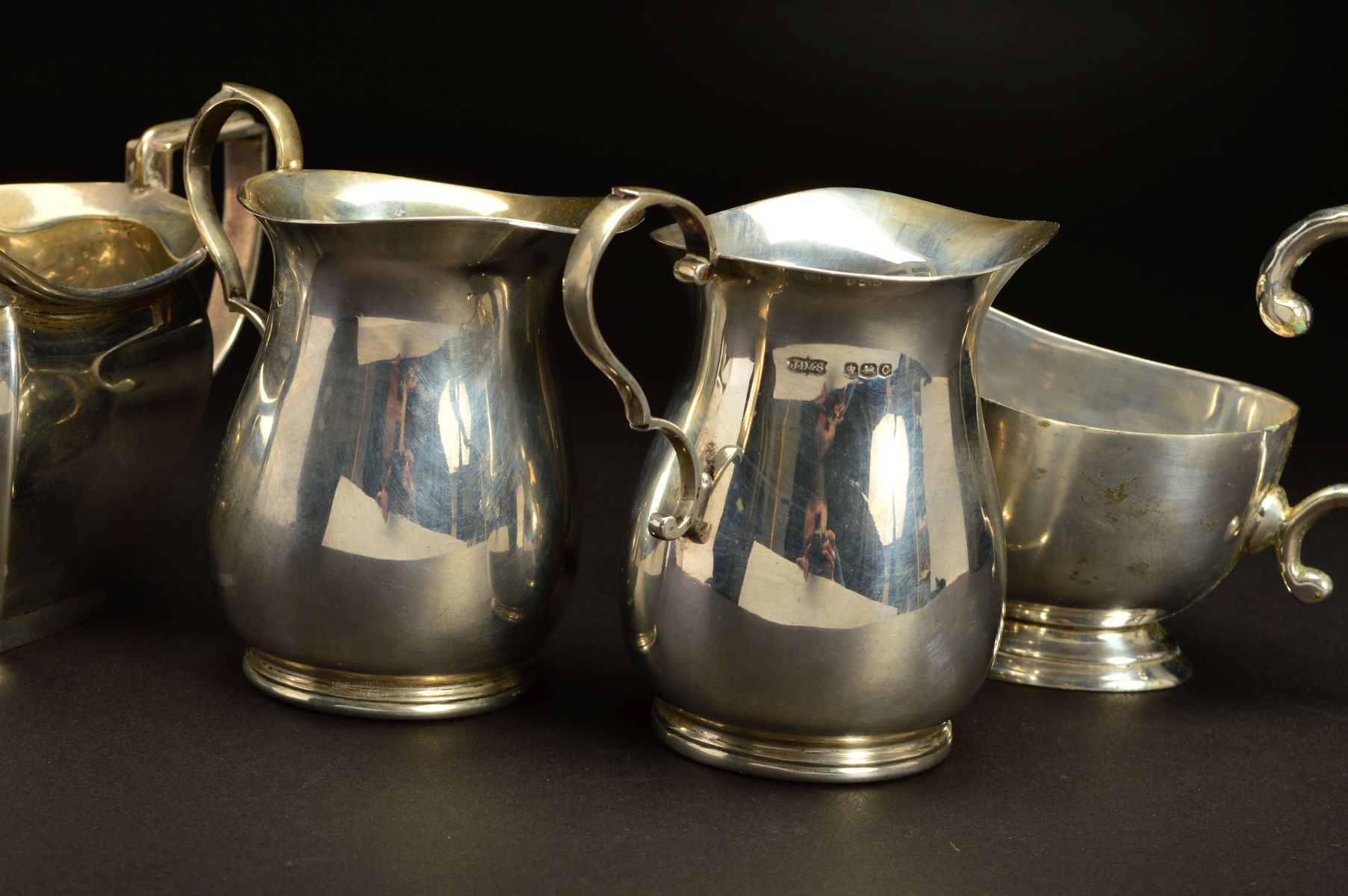 A PAIR OF GEORGE VI SILVER BALUSTER CREAM JUGS, 'S' scroll handles, makers James Dixon & Sons Ltd, - Image 4 of 5