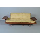 A TOOTHILL 1950'S/60'S DANISH STYLE AFROMOSIA TEAK DAY BED/SOFA, with a flip over back and flanked