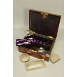 AN EARLY VICTORIAN ROSEWOOD AND BRASS INLAID DRESSING CASE, of rectangular form, the hinged lid