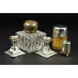 A LATE VICTORIAN SILVER TOPPED SQUARE GLASS INKWELL, hinged domed top cover over ribbed sides with