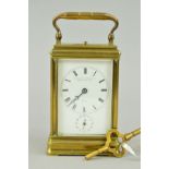 A 19TH CENTURY SWISS BRASS CASED REPEATING ALARM CARRIAGE CLOCK, the white enamel dial marked 'ANCNE