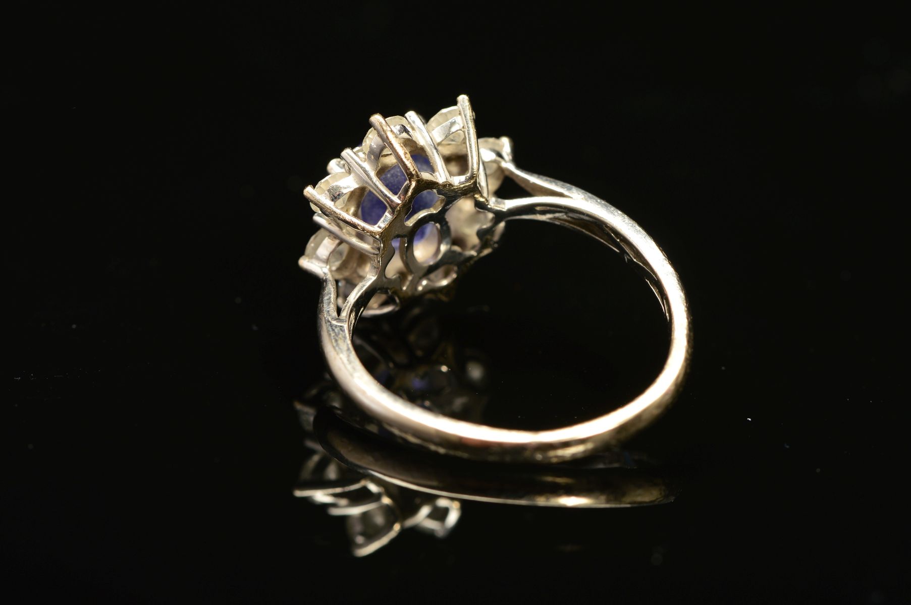 A MODERN 18CT WHITE GOLD TANZANITE AND DIAMOND OVAL CLUSTER RING, oval mixed cut tanzanite measuring - Image 4 of 5