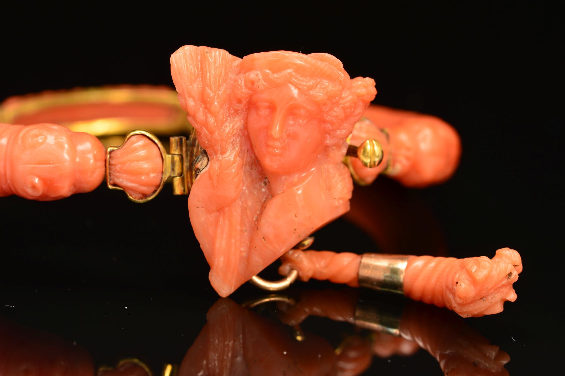 A DELICATE VICTORIAN CARVED CORAL BANGLE, centring on a carved cameo depicting Demeter, suspending a - Image 4 of 4