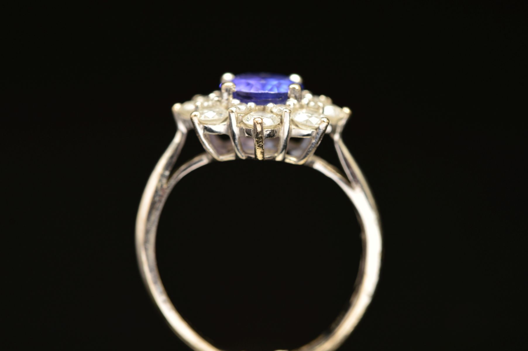 A MODERN 18CT WHITE GOLD TANZANITE AND DIAMOND OVAL CLUSTER RING, oval mixed cut tanzanite measuring - Image 5 of 5