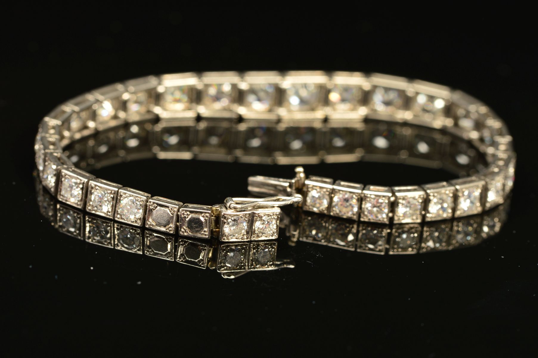 AN ART DECO GRADUATED DIAMOND LINE BRACELET, brilliant cut diamonds, each set to a box setting - Image 3 of 5