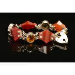 A SCOTTISH BRACELET, designed as four shaped agate pieces, each interspaced by an oval citrine to